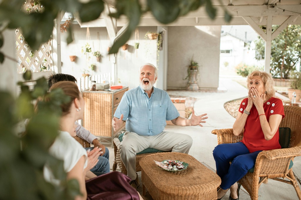 A family smile at each other.
</div>
</div>
<div class=